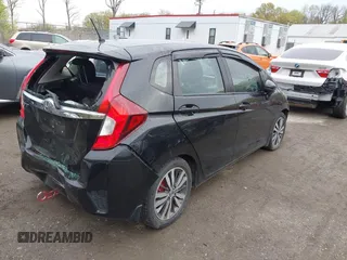 2015 Honda Fit EX-L with VIN 3HGGK5H88FM726406, listed as a IAAI auction lot 42033501 with 124,216 mi miles. Bid and sale history available at carsss.com. Image 4.