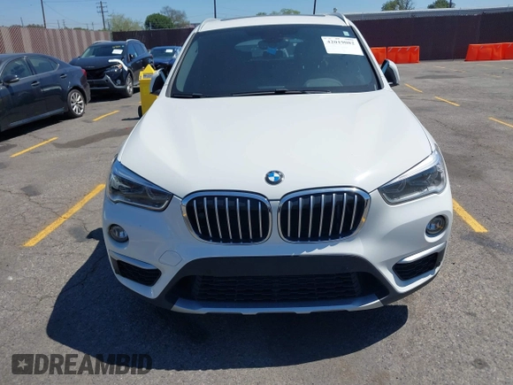 2017 BMW X1 xDrive28i with VIN WBXHT3C33H5F86831, listed as a IAAI auction lot 42019082 with 74,708 mi miles and . Bid and sale history available at DreamBid. Image 12.