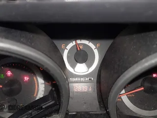 2014 Scion tC with VIN JTKJF5C77E3069906, listed as a IAAI auction lot 41243445 with 128,791 mi miles. Bid and sale history available at carsss.com. Image 7.