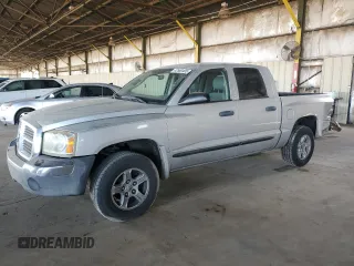 2005 Dodge Dakota SLT with VIN 1D7HE48K15S112874, listed as a Copart auction lot 42560405 with 194,887 mi miles and Salvage Title. Bid and sale history available at DreamBid. Image 1.