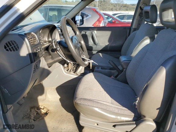 1998 Isuzu Rodeo S with VIN 4S2CM58W7W4323393, listed as a Copart auction lot 77571224 with 261,881 mi miles and Clean Title. Bid and sale history available at carsss.com. Image 7.