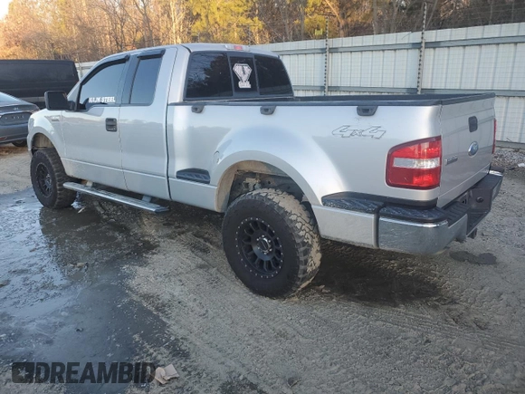 2006 Ford F-150 XLT with VIN 1FTPX04596KB93701, listed as a Copart auction lot 87672425 with 102,128 mi miles and Salvage title. Bid and sale history available at DreamBid. Image 2.