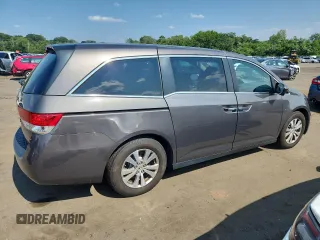 2014 Honda Odyssey EX-L with VIN 5FNRL5H63EB036388, listed as a Copart auction lot 65701425 with 117,636 mi miles and Clean title. Bid and sale history available at DreamBid. Image 3.