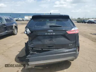 2022 Ford Edge SEL z VIN 2FMPK4J97NBA83621, wystawiony jako Copart lot #54874805 z przebiegiem 72 892 mil mil oraz Nie do naprawy • Non repairable. Historia ofert i sprzedaży dostępna na DreamBid. Obrazek 6.