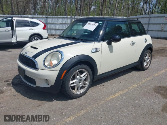 2007 MINI Hardtop S with VIN WMWMF73567TT84033, listed as a IAAI auction lot 42189573 with 75,177 mi miles and . Bid and sale history available at DreamBid. Image 2.
