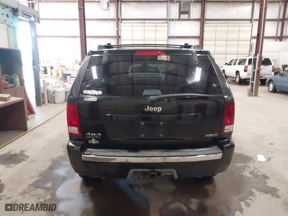 2007 Jeep Grand Cherokee Limited with VIN 1J8HR58287C572544, listed as a IAAI auction lot 41366475 with 231,151 mi miles. Bid and sale history available at carsss.com. Image 16.