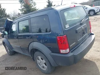 2008 Dodge Nitro SXT with VIN 1D8GU28K28W189765, listed as a IAAI auction lot 41834961 with 214,837 mi miles. Bid and sale history available at carsss.com. Image 3.