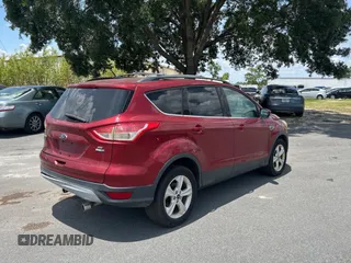 2013 Ford Escape SE with VIN 1FMCU9G95DUD25554, listed as a Copart auction lot 58242885 with Not provided miles and Clean title. Bid and sale history available at DreamBid. Image 4.