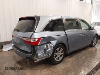 2013 Honda Odyssey EX-L with VIN 5FNRL5H67DB015512, listed as a IAAI auction lot 41758695 with 193,356 mi miles and . Bid and sale history available at carsss.com. Image 6.