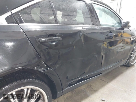 2011 Ford Taurus SEL with VIN 1FAHP2EW4BG160633, listed as a IAAI auction lot 41778406 with 125,934 mi miles. Bid and sale history available at carsss.com. Image 12.