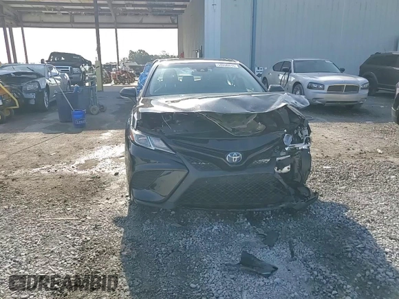 2019 Toyota Camry Hybrid LE z VIN 4T1B21HK1KU516390, wystawiony jako Copart lot #54856015 z przebiegiem 94 504 mil mil oraz Nie do naprawy • Non repairable. Historia ofert i sprzedaży dostępna na DreamBid. Obrazek 14.