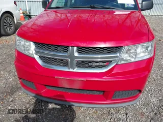 2013 Dodge Journey SE with VIN 3C4PDCABXDT721228, listed as a IAAI auction lot 41662172 with 311,815 mi miles. Bid and sale history available at carsss.com. Image 6.