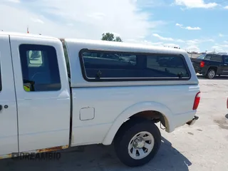 2002 Ford Ranger XL Fleet with VIN 1FTYR44V12PB49923, listed as a IAAI auction lot 42683323 with 116,249 mi miles and . Bid and sale history available at DreamBid. Image 14.