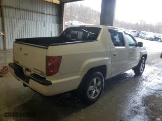 2010 Honda Ridgeline RTL with VIN 5FPYK1F57AB502049, listed as a Copart auction lot 87058684 with 228,156 mi miles and Clean Title. Bid and sale history available at carsss.com. Image 3.