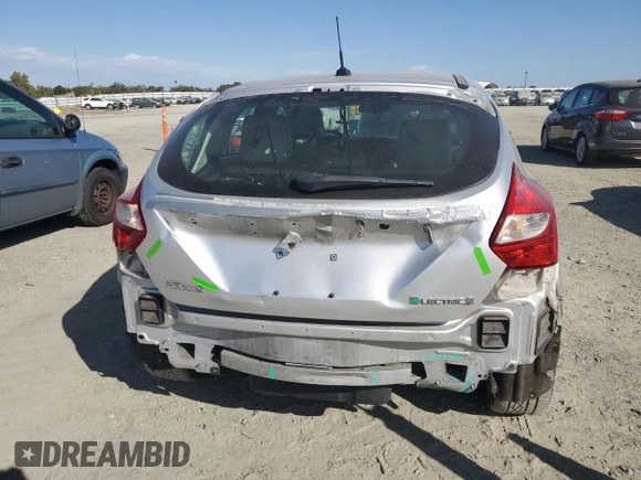 2014 Ford Focus Electric with VIN 1FADP3R45EL287285, listed as a Copart auction lot 74148154 with 64,543 mi miles and Salvage title. Bid and sale history available at DreamBid. Image 6.