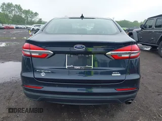 2020 Ford Fusion SEL z VIN 3FA6P0CD9LR183400, wystawiony jako IAAI lot #42271491 z przebiegiem 52 020 mil mil oraz . Historia ofert i sprzedaży dostępna na DreamBid. Obrazek 16.