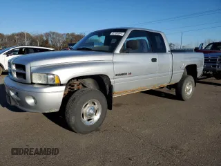 2001 Dodge Ram 2500 with VIN 3B7KF23Z31G821023, listed as a Copart auction lot 82185604 with 77,364 mi miles and Clean Title. Bid and sale history available at carsss.com. Image 1.
