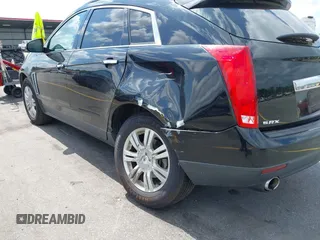 2014 Cadillac SRX with VIN 3GYFNAE30ES641616, listed as a IAAI auction lot 42000120 with 145,000 mi miles and . Bid and sale history available at DreamBid. Image 12.