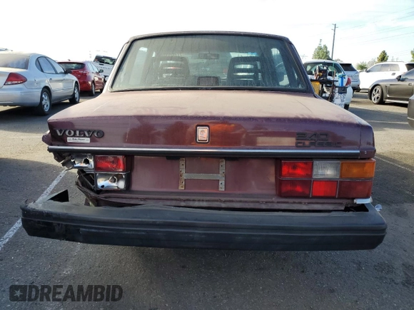 1993 Volvo 240 z VIN YV1AS8801P1487953, wystawiony jako Copart lot #77392634 z przebiegiem 270 844 mil mil oraz Szkody całkowita. Historia ofert i sprzedaży dostępna na DreamBid. Obrazek 6.