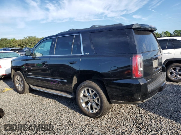 2015 GMC Yukon SLT with VIN 1GKS2BKC9FR118305, listed as a Copart auction lot 73833994 with 0 mi miles and Salvage Title. Bid and sale history available at carsss.com. Image 2.