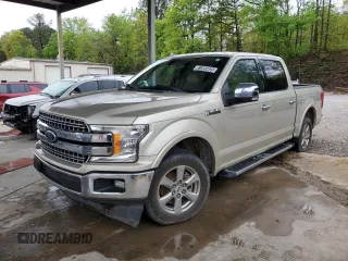 2018 Ford F-150 XL with VIN 1FTEW1C5XJFB08934, listed as a Copart auction lot 58098725 with 148,449 mi miles and Clean title. Bid and sale history available at DreamBid. Image 1.