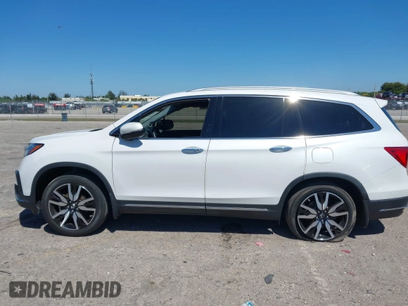 2022 Honda Pilot Touring 7-Passenger с VIN 5FNYF5H66NB034248, выставлен на аукционе IAAI как лот 41777362 с пробегом 26 611 миль миль и . История ставок и продаж доступна на DreamBid. Изображение 13.