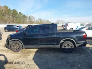 2019 Honda Ridgeline Sport with VIN 5FPYK2F12KB007990, listed as a IAAI auction lot 41828709 with 67,736 mi miles and . Bid and sale history available at DreamBid. Image 14.