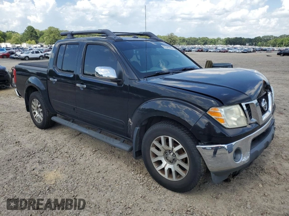 2011 Nissan Frontier SL with VIN 1N6AD0ERXBC440046, listed as a Copart auction lot 61645595 with 130,639 mi miles and Salvage title. Bid and sale history available at DreamBid. Image 4.