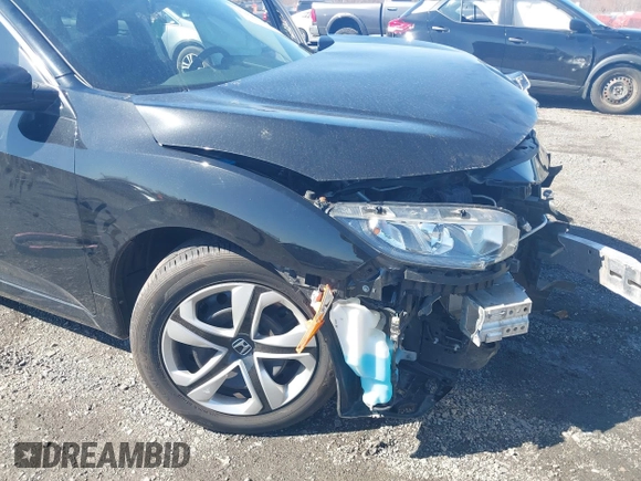 2018 Honda Civic LX with VIN 19XFC2F58JE042456, listed as a IAAI auction lot 41823195 with 45,291 mi miles and . Bid and sale history available at DreamBid. Image 6.