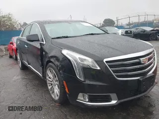 2019 Cadillac XTS Luxury with VIN 2G61M5S33K9151438, listed as a IAAI auction lot 41721683 with 103,942 mi miles and . Bid and sale history available at DreamBid. Image 1.