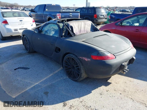 1998 Porsche Boxster с VIN WP0CA2982WU621935, выставлен на аукционе IAAI как лот 41838363 с пробегом Не указан миль и . История ставок и продаж доступна на DreamBid. Изображение 3.