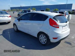2013 Ford Fiesta S с VIN 3FADP4TJ3DM215650, выставлен на аукционе IAAI как лот 42462870 с пробегом 142 762 миль миль и . История ставок и продаж доступна на DreamBid. Изображение 3.