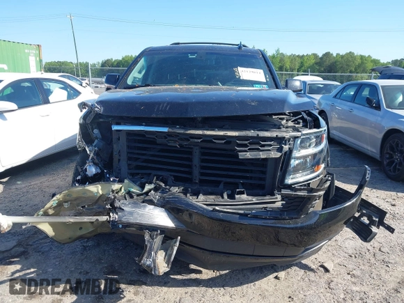 2019 Chevrolet Suburban LS with VIN 1GNSKGKC2KR353977, listed as a IAAI auction lot 42129814 with 85,454 mi miles and . Bid and sale history available at DreamBid. Image 12.