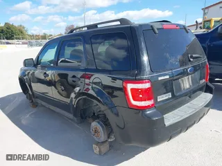 2010 Ford Escape XLT with VIN 1FMCU9D74AKC23611, listed as a IAAI auction lot 40600485 with 171,152 mi miles. Bid and sale history available at carsss.com. Image 3.