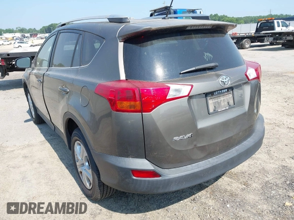 2014 Toyota RAV4 LE with VIN JTMZFREVXED034316, listed as a IAAI auction lot 42610135 with 214,871 mi miles and . Bid and sale history available at DreamBid. Image 3.