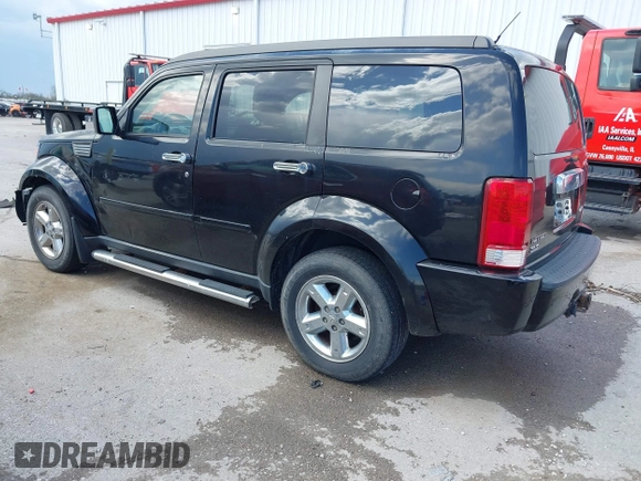 2007 Dodge Nitro SLT with VIN 1D8GU58K97W679278, listed as a IAAI auction lot 42014211 with 213,451 mi miles and . Bid and sale history available at carsss.com. Image 3.