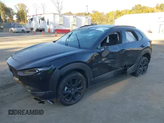 2023 Mazda CX-30 2.5 S Premium Package with VIN 3MVDMBDM5PM536219, listed as a IAAI auction lot 40710444 with 16,863 mi miles. Bid and sale history available at carsss.com. Image 2.