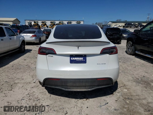 2022 Tesla Model Y Long Range with VIN 7SAYGDEE7NA012634, listed as a Copart auction lot 49206295 with 19,267 mi miles and Clean Title. Bid and sale history available at DreamBid. Image 6.