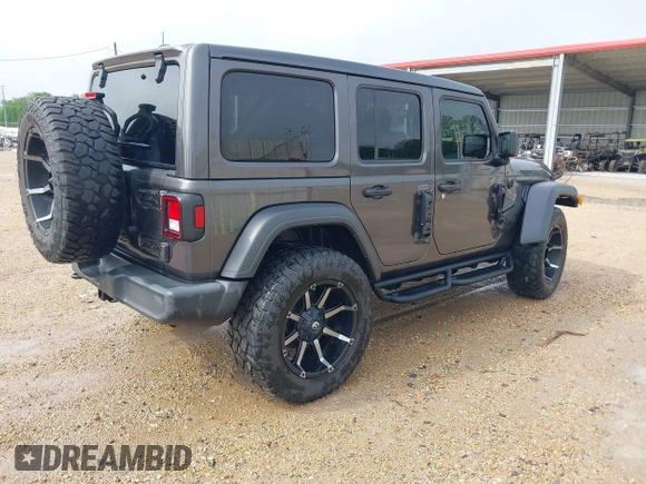 2021 Jeep Wrangler Unlimited Sport S with VIN 1C4HJXDG2MW700461, listed as a IAAI auction lot 41894307 with 82,454 mi miles. Bid and sale history available at carsss.com. Image 4.