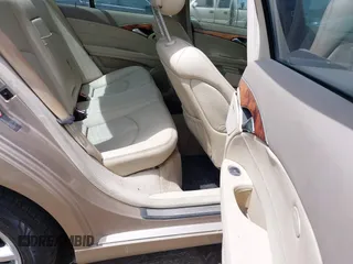 2003 Mercedes-Benz E-Class 3.2L with VIN WDBUF65J23A243178, listed as a IAAI auction lot 41974660 with 134,459 mi miles. Bid and sale history available at carsss.com. Image 8.
