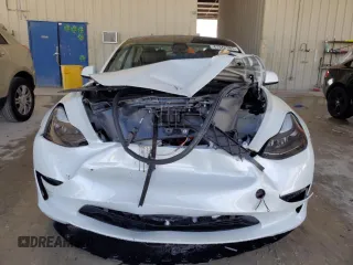 2023 Tesla Model 3 with VIN 5YJ3E1EA3PF515480, listed as a Copart auction lot 47342385 with 15,309 mi miles and Non Repairable. Bid and sale history available at carsss.com. Image 5.