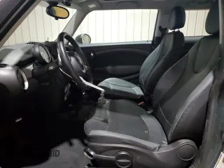 2008 MINI Hardtop with VIN WMWMF33558TT66729, listed as a Copart auction lot 51153645 with 127,357 mi miles and Salvage Title. Bid and sale history available at DreamBid. Image 7.