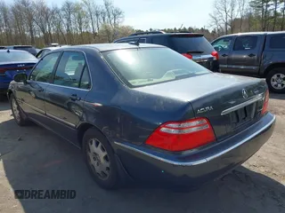 2004 Acura RL w/Navigation System with VIN JH4KA96634C006366, listed as a IAAI auction lot 42054689 with 350,809 mi miles. Bid and sale history available at carsss.com. Image 3.