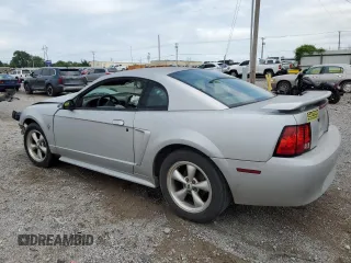 2002 Ford Mustang Standard with VIN 1FAFP40412F190297, listed as a Copart auction lot 61251985 with Not provided miles and Salvage title. Bid and sale history available at DreamBid. Image 2.