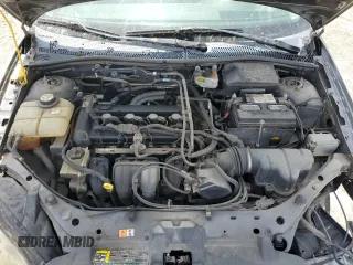 2007 Ford Focus S z VIN 1FAHP34N17W103625, wystawiony jako Copart lot #55300395 z przebiegiem 82 041 mil mil oraz Szkoda całkowita • Salvage title. Historia ofert i sprzedaży dostępna na DreamBid. Obrazek 11.