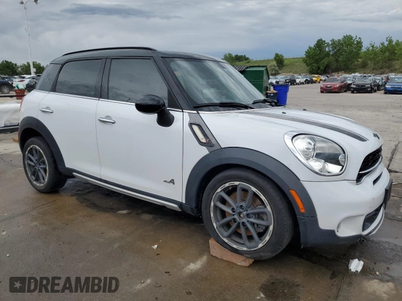 2015 MINI Countryman S with VIN WMWZC5C58FWP46931, listed as a Copart auction lot 59183495 with 105,731 mi miles and Salvage title. Bid and sale history available at DreamBid. Image 4.