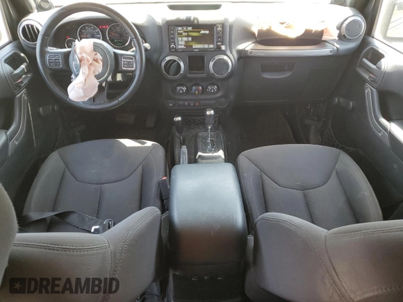 2014 Jeep Wrangler Unlimited Sport with VIN 1C4BJWDG1EL298161, listed as a Copart auction lot 61996735 with 176,043 mi miles and Salvage title. Bid and sale history available at DreamBid. Image 8.