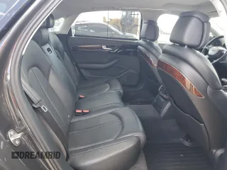 2012 Audi A8 z VIN WAURVAFD2CN021722, wystawiony jako Copart lot #58353745 z przebiegiem 117 302 mil mil oraz Szkoda całkowita • Salvage title. Historia ofert i sprzedaży dostępna na DreamBid. Obrazek 10.