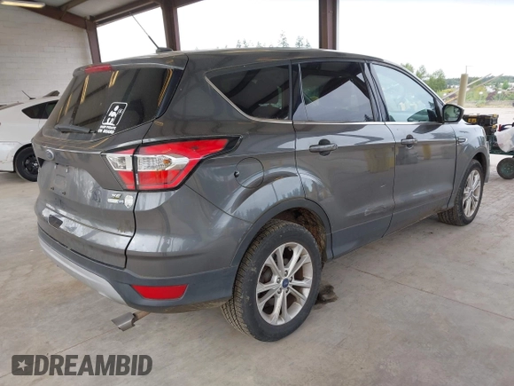 2017 Ford Escape SE z VIN 1FMCU9G93HUC97081, wystawiony jako IAAI lot #42327866 z przebiegiem 97 580 mil mil oraz . Historia ofert i sprzedaży dostępna na DreamBid. Obrazek 4.