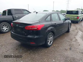 2017 Ford Focus SE with VIN 1FADP3F26HL276139, listed as a IAAI auction lot 42316774 with 165,227 mi miles and . Bid and sale history available at DreamBid. Image 4.